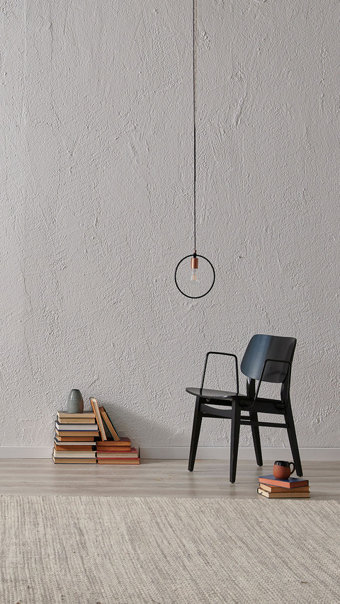 Decorative grey room concept with carpet chair screenshot