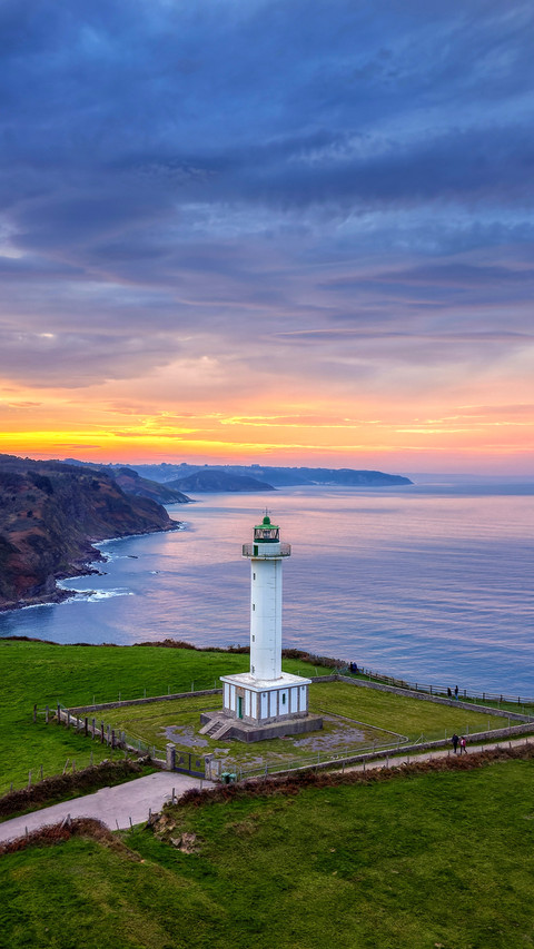 The Lastres lighthouse at sunset in the town of Luces screenshot