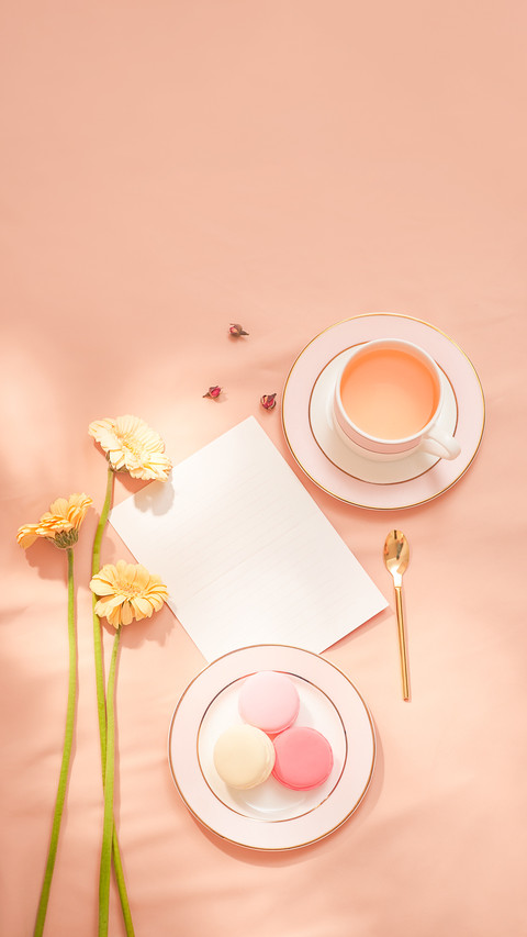 Envelope, Flowers, and Macarons with Cup of Tea screenshot