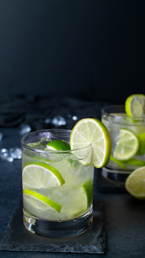 Brazilian traditional cocktail Caipirinha with lime screenshot
