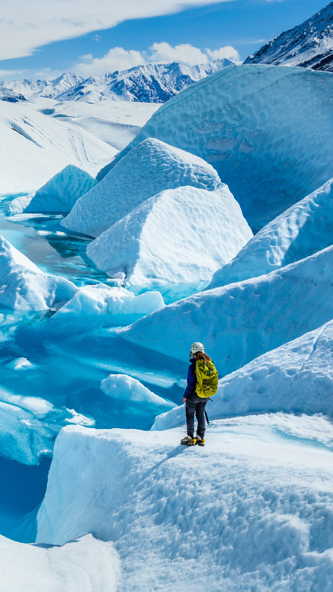 A Woman is Standing on Glacier screenshot