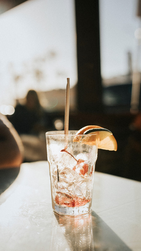 Empty cocktail glass at a bar screenshot