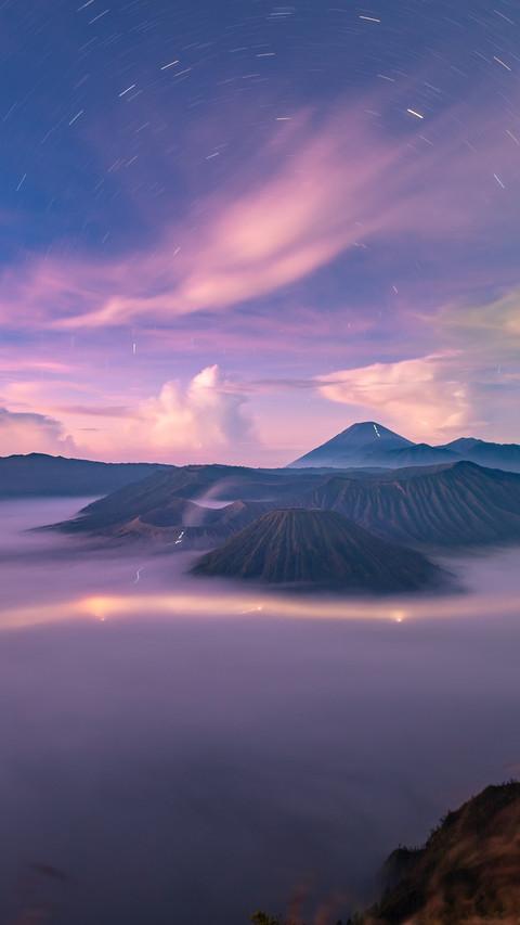 Trails of Stars in Bromo Volcano Night Sky screenshot