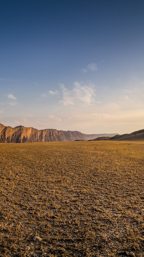 The sunset scenery in the canyon of xinjiang in autumn screenshot