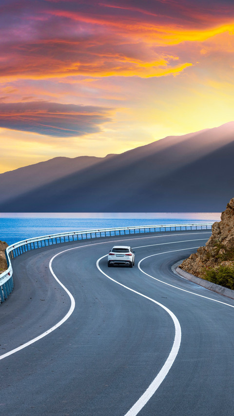 Serene Road to the Sunset, Ocean and Mountains in View screenshot