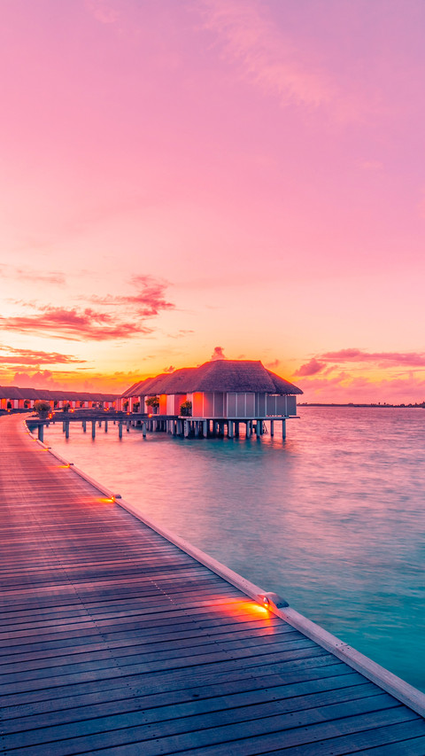 Amazing sunset panorama Maldives luxury resort villas screenshot