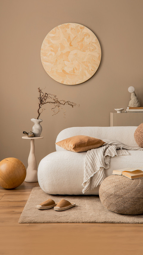 Warm and cozy living room interior with round wall panel screenshot