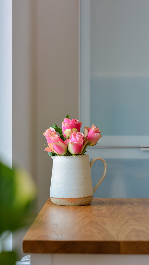 Handmade ceramic jug as flower vase screenshot