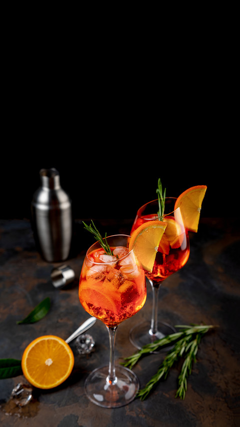 Ice cold Aperol spritz cocktail served in a wine glass screenshot