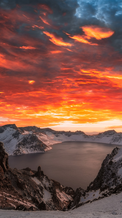 In winter the snowcapped mountains are ablaze with clouds screenshot