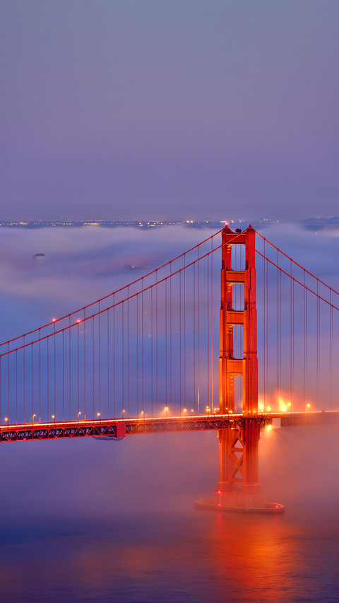 Fog covers the Golden Gate Bridge at sunset, CA-USA screenshot