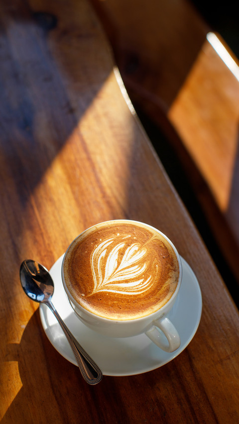 A cup of coffee with latte art in the morning screenshot