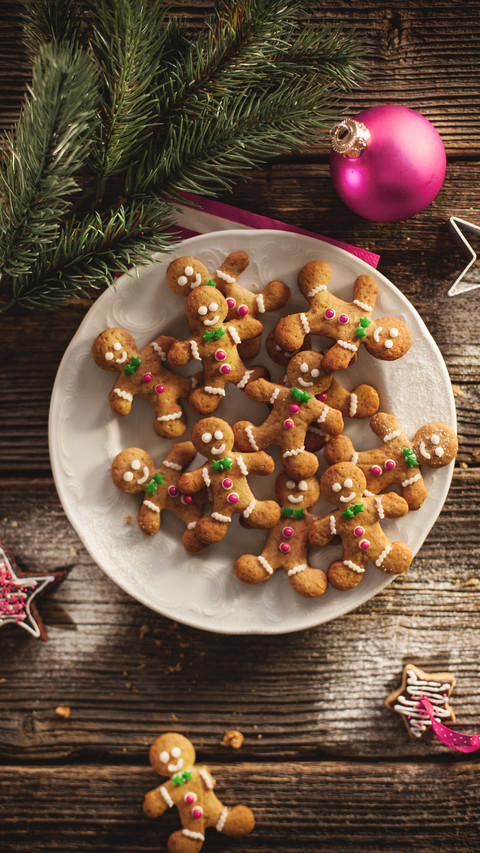 Christmas gingerbread cookies on a wooden table screenshot