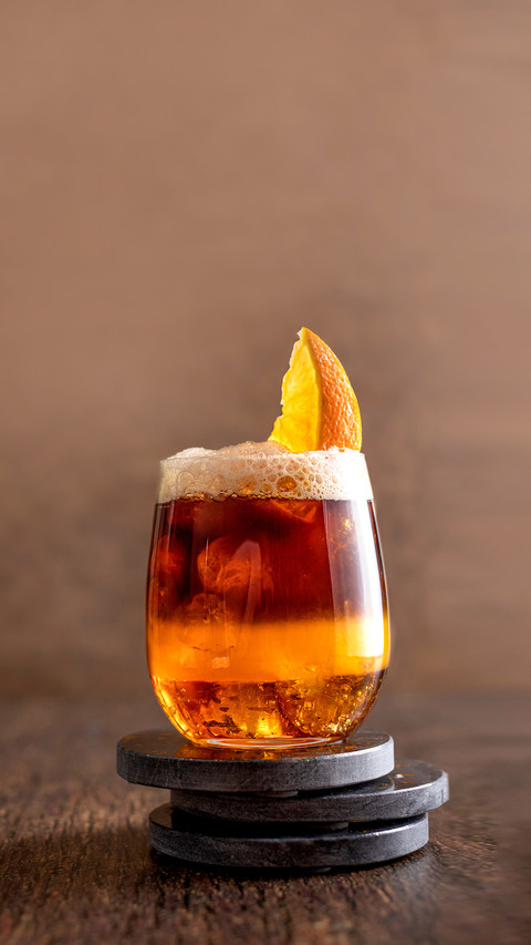 Bumble coffee layered cocktail with syrup and orange juice screenshot