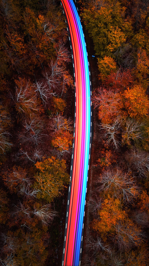 Colorful lights on the mountain road screenshot