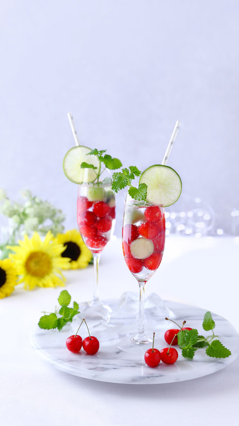 Glasses of Soda with Fresh Cherry and Kiwi Fruits screenshot