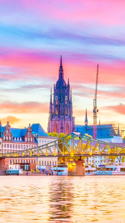View of Frankfurt city skyline in Germany at sunset screenshot