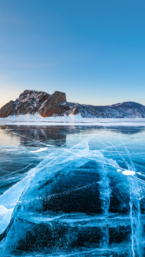 Baikal Lake’s transparent, cracked blue ice in winter screenshot