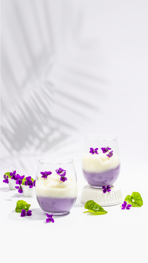 Vegan Panna Cotta Dessert with Fresh Violet Flower screenshot