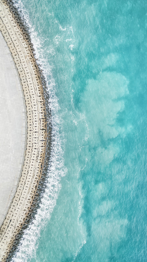 Aerial view of dalians coastline in blue screenshot