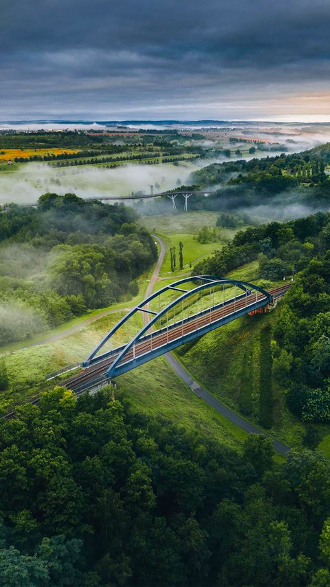 Bridge across valley between the mountains in Germany screenshot
