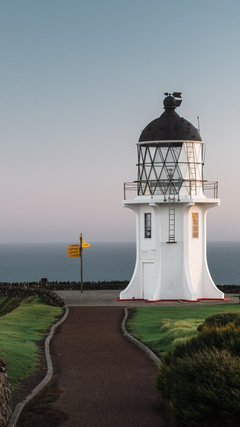 Seaside Lighthouse, Guardian of Tranquil Waters screenshot