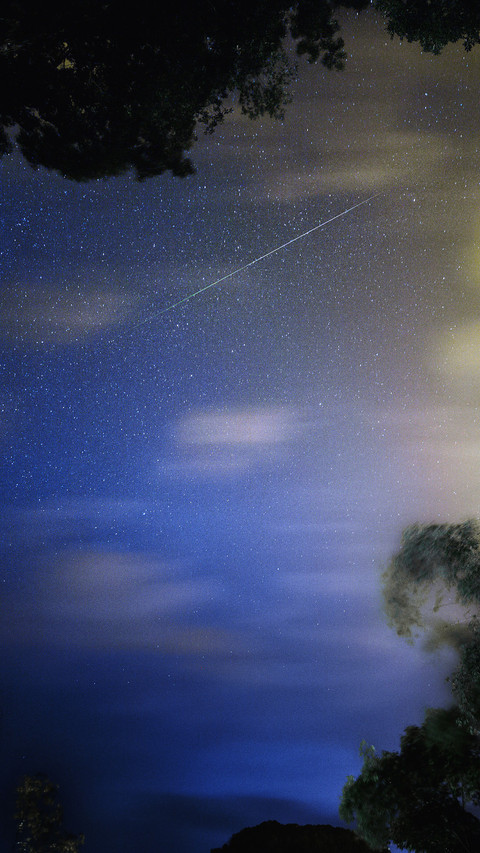 The trajectory of a meteor streaking across the night sky screenshot