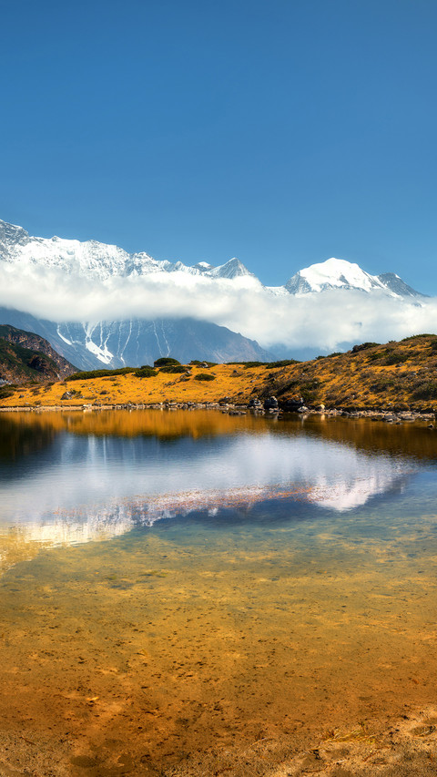 Beautiful view with high rocks with snow covered peaks screenshot