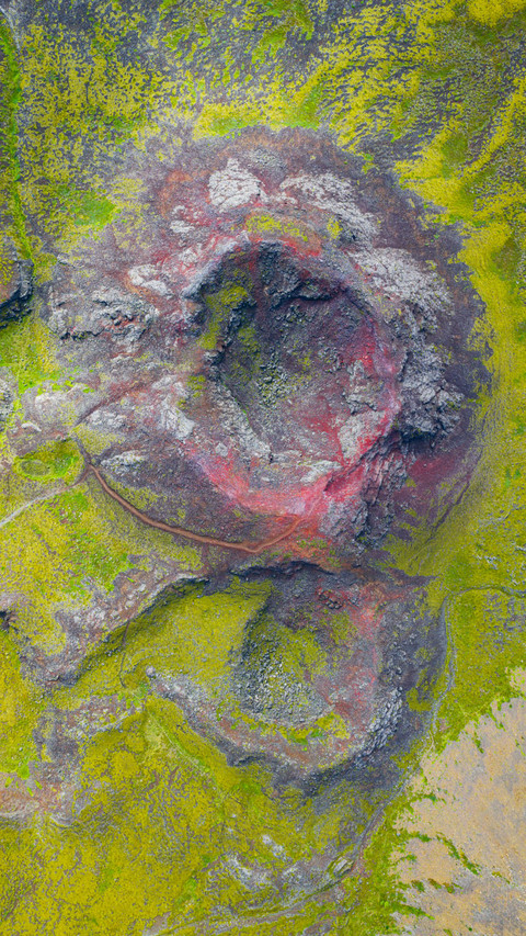 Overlooking the green moss-covered volcano in Iceland screenshot