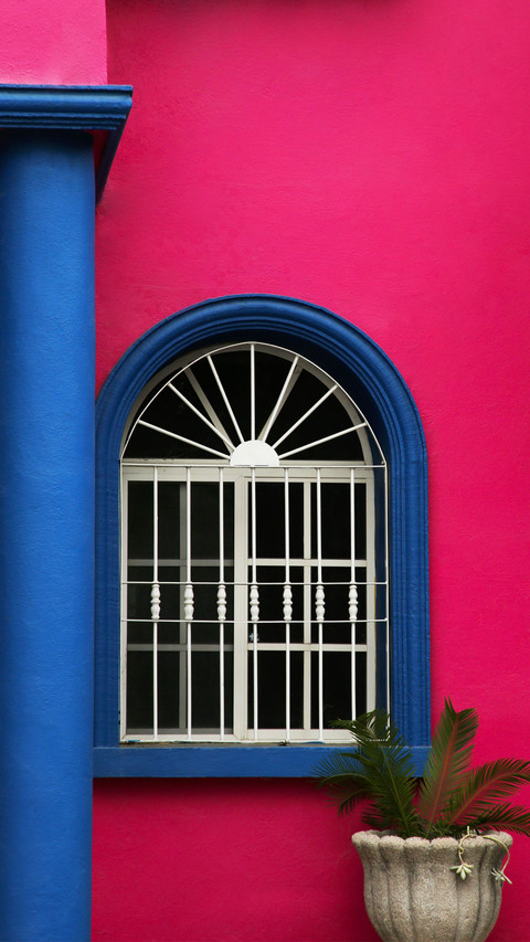 Colorful building with beautiful window and steel grilles ou screenshot