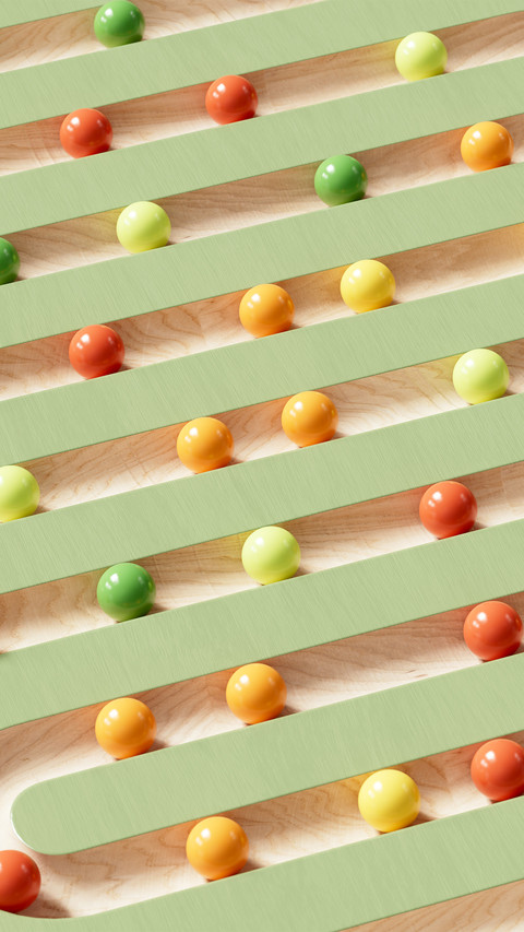 Colorful small balls with a green background screenshot