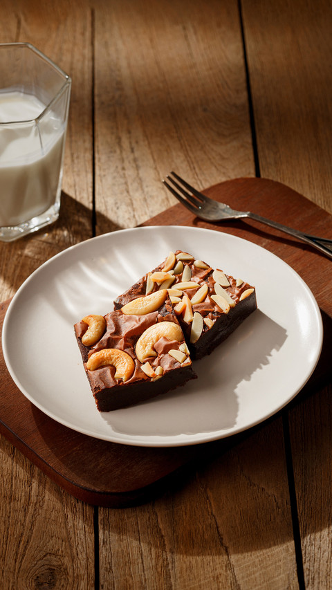 Almond and cashew nuts chocolate brownie on table screenshot