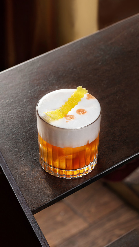 Old fashioned cocktail in a transparent whiskey glass screenshot