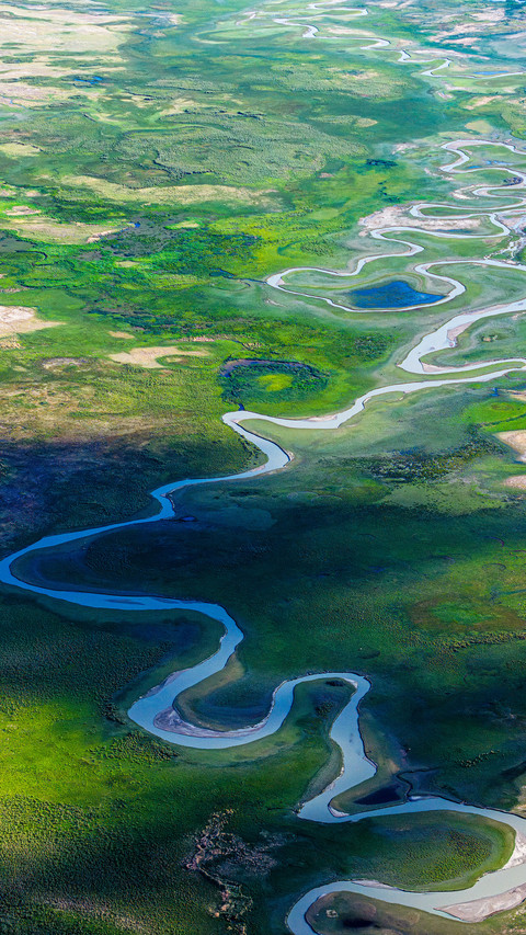 Aerial photography of grasslands and rivers screenshot
