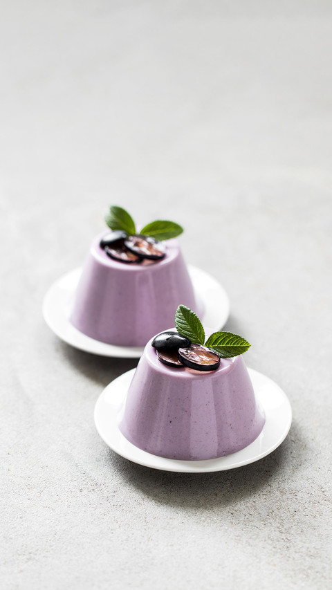 Creamy berry dessert, black grape Panna Cotta on a plate screenshot