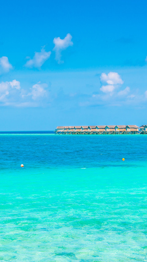 Beautiful water villas in tropical Maldives island screenshot