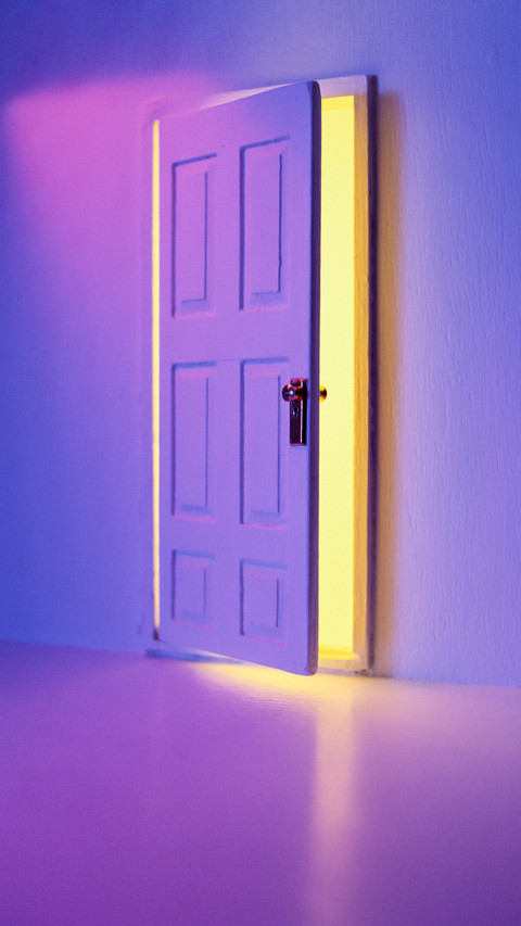 Opened door to yellow background screenshot