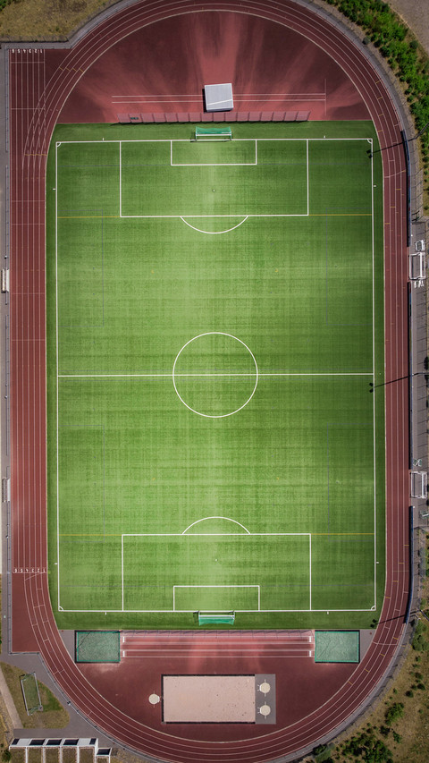 Different foodball field shot by drone screenshot