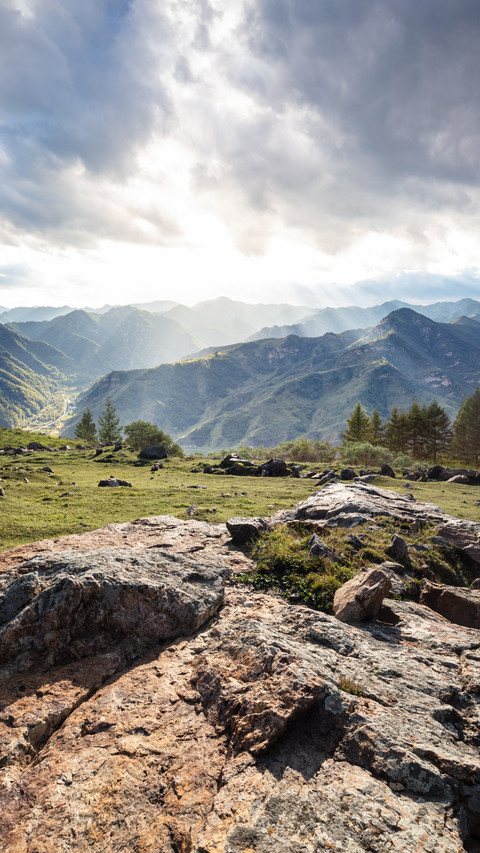 The stone platform at the mountain top offers a panoramic screenshot