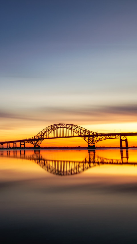 Serene Bridge at Dusk, Sky and Water Merge in Calm screenshot