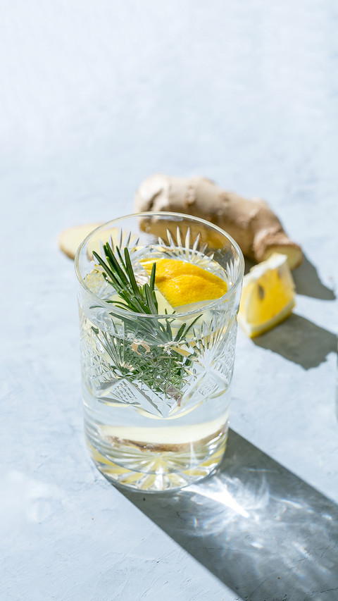 Glass of Detox infused water with lemon, ginger and rosemary screenshot