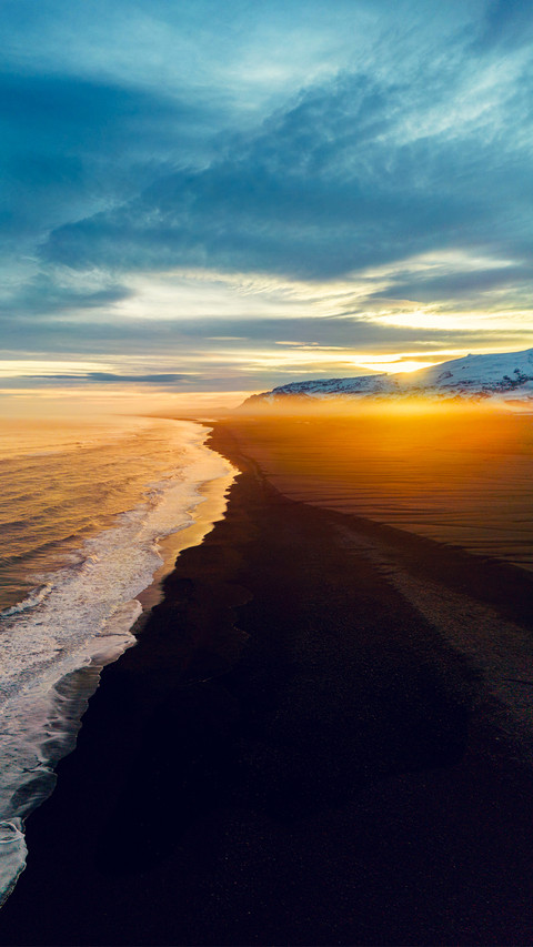 Aerial view of nordic black sand beach in iceland screenshot