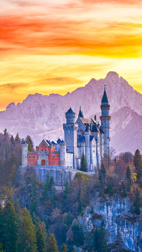 Famous Neuschwanstein castle in Germany during sunset screenshot