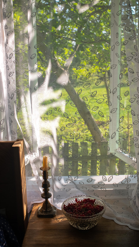 Open window in a vintage countryside cottage screenshot