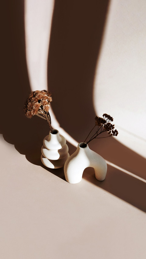 Modern beige ceramic vases set with dry grass screenshot