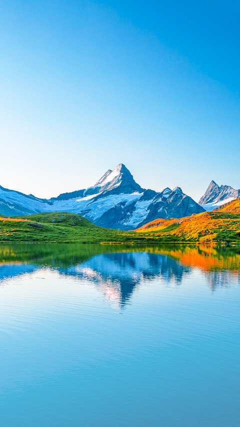 Scenic view on Bernese range above Bachalpsee lake screenshot