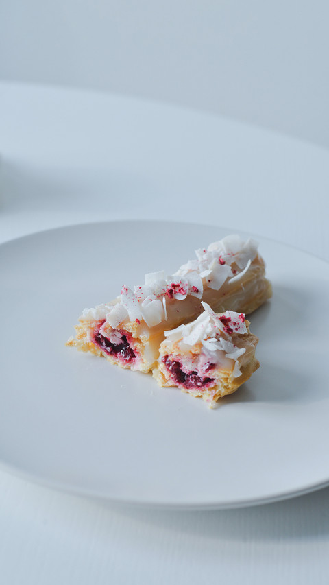 Two pieces of eclair on white plate screenshot