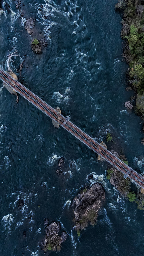 Abandoned railway tracks on the river screenshot