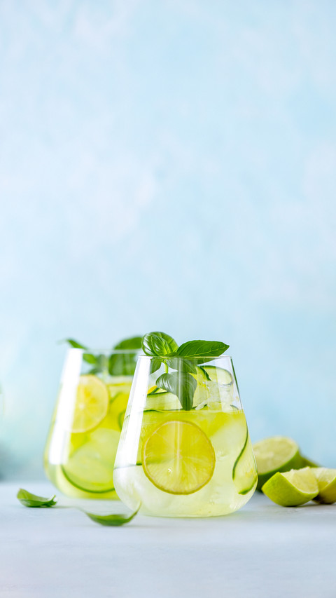 Cucumber and Basil Gin and Tonic Cocktail in Glasses screenshot